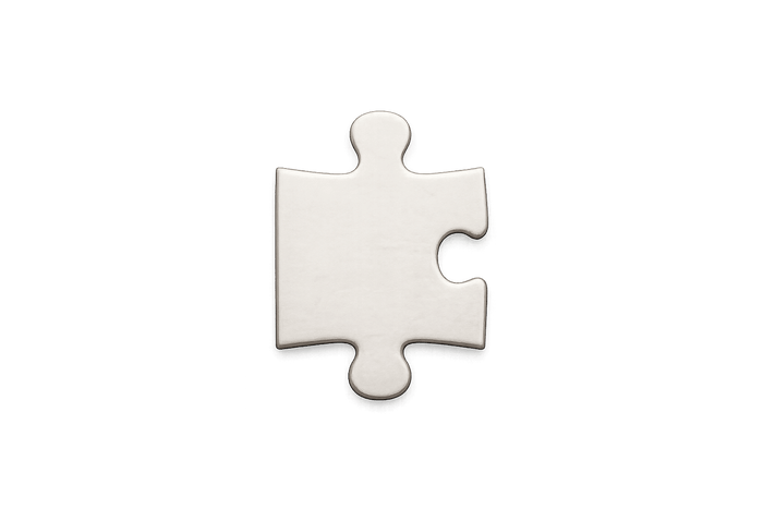 Traditional cardboard jigsaw puzzle piece